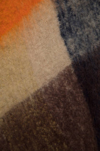 Poncho a quadri con frange