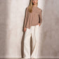 Maglione in maglia con sciarpa abbinata