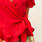 Top incrociato rosso con volant