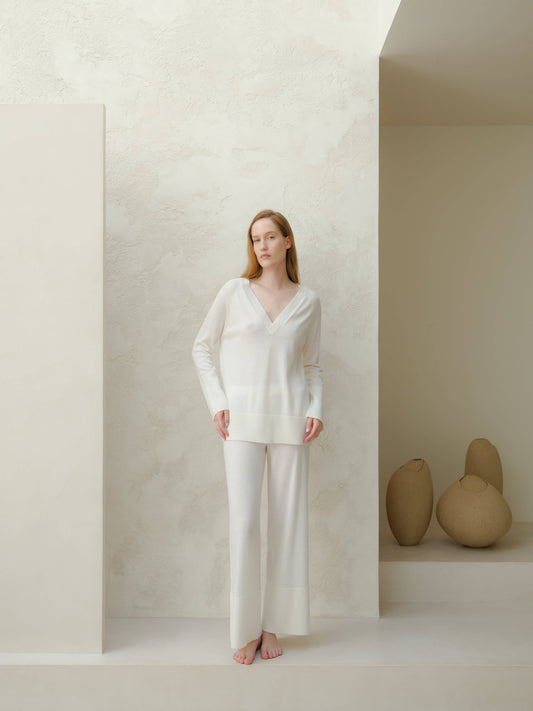 Maxi maglione in lana merino extra fine con scollo a V