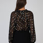 Blusa Souella nera in tessuto velato con paillettes multicolor