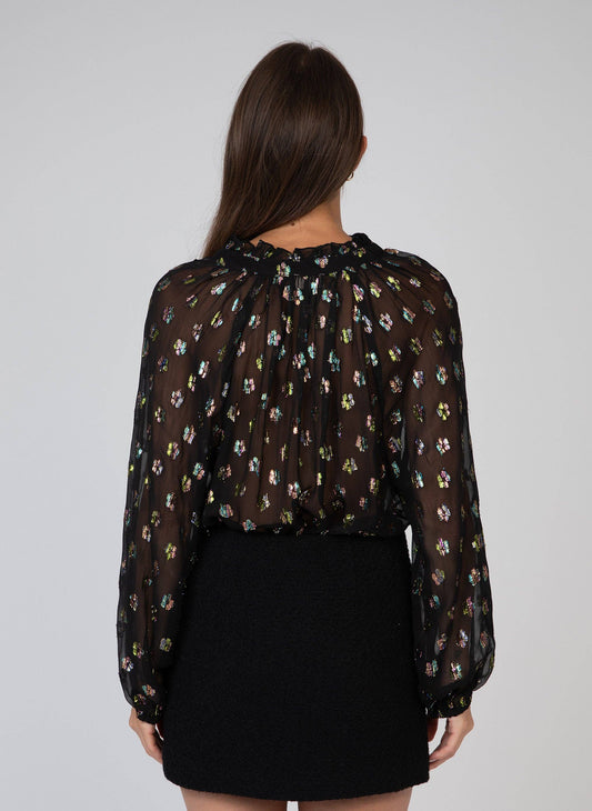 Blusa Souella nera in tessuto velato con paillettes multicolor