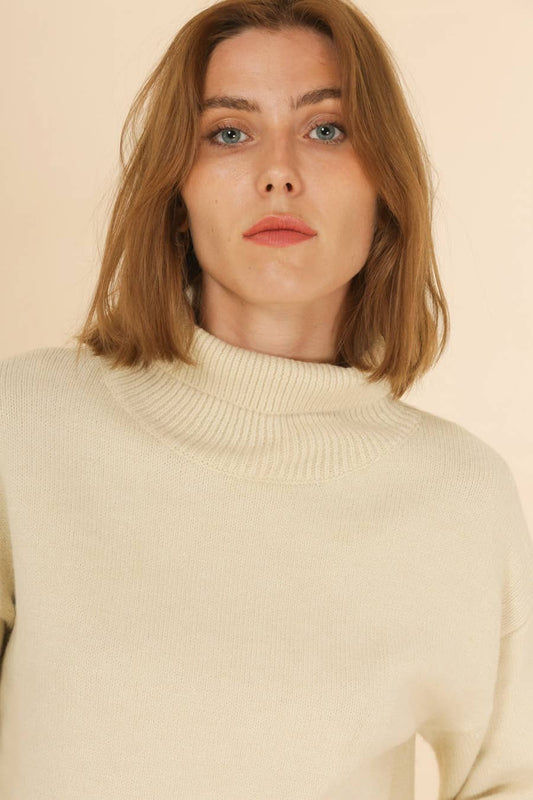 Maglione dolcevita in maglia Matis con polsini a bottoni