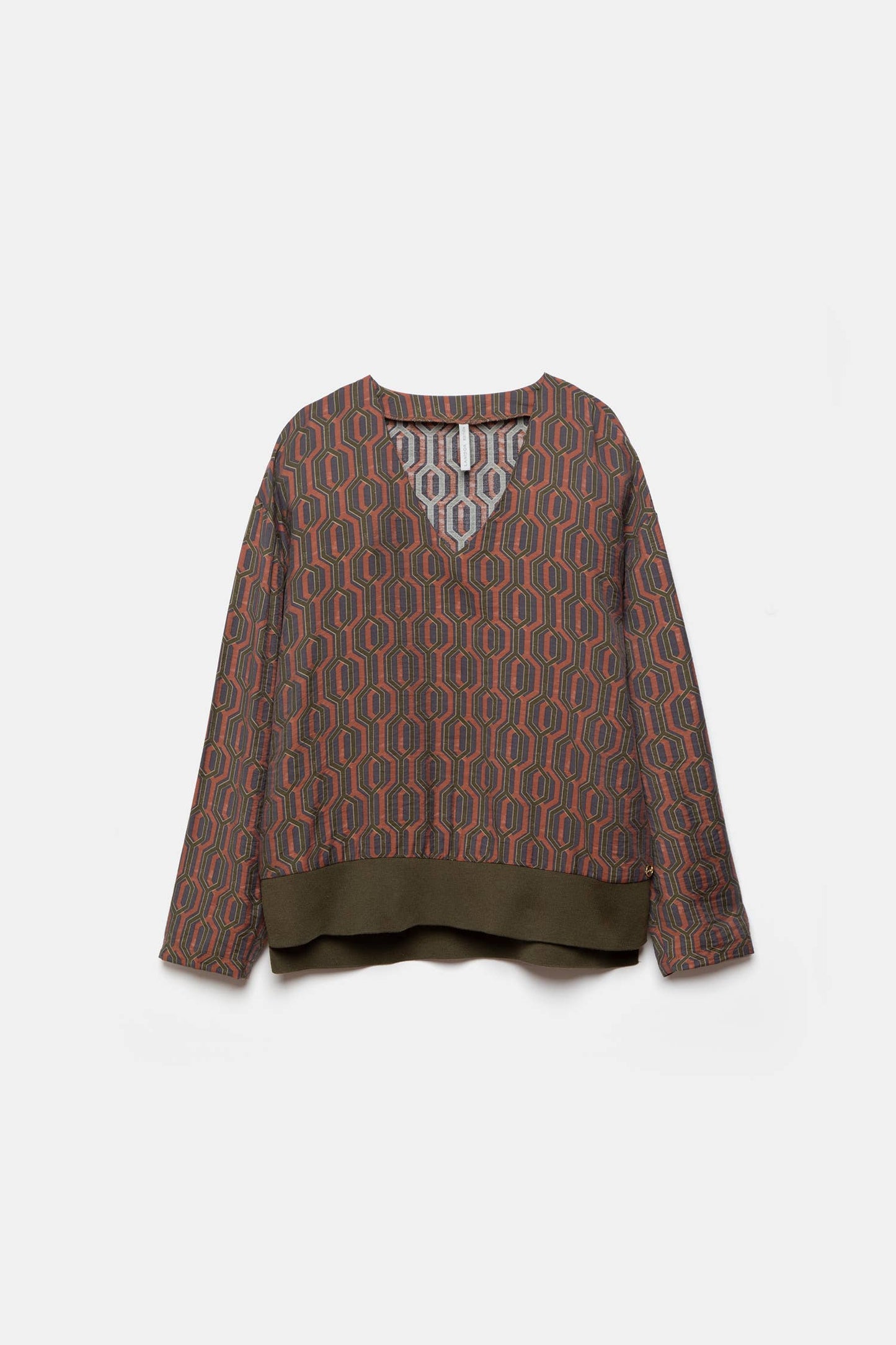 Blusa geometrica con scollo a V