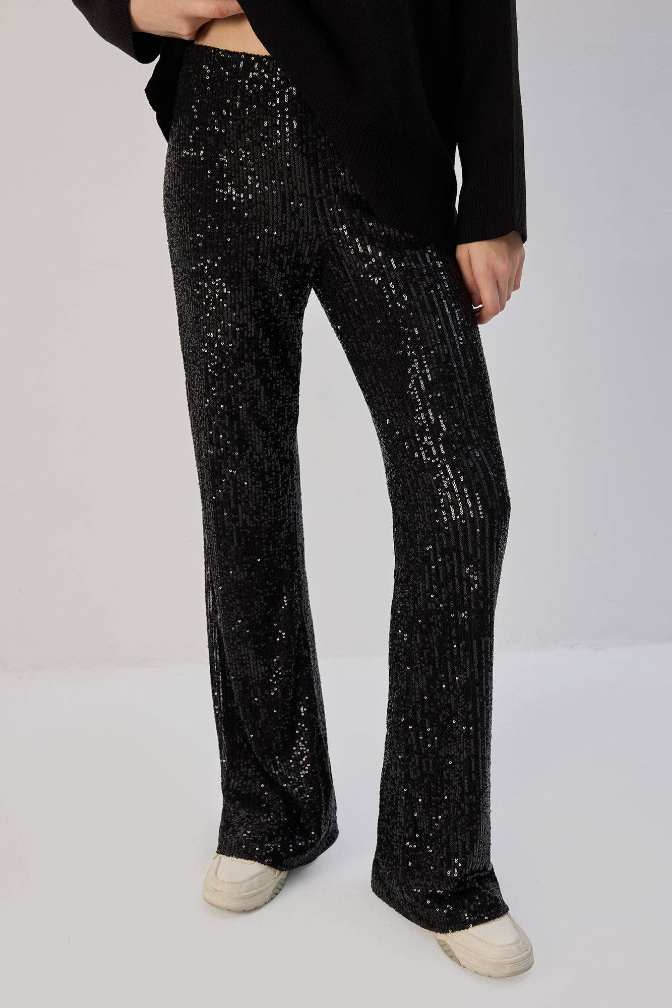Pantaloni a zampa con paillettes