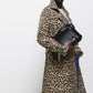 Trench doppiopetto animalier con cintura