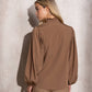 Blusa con maniche a palloncino e collo arricciato