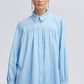 Camicia azzurra in viscosa con maniche arricciate