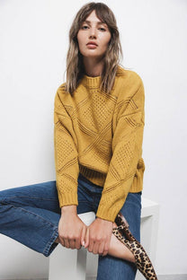 Maglione strutturato in maglia con girocollo
