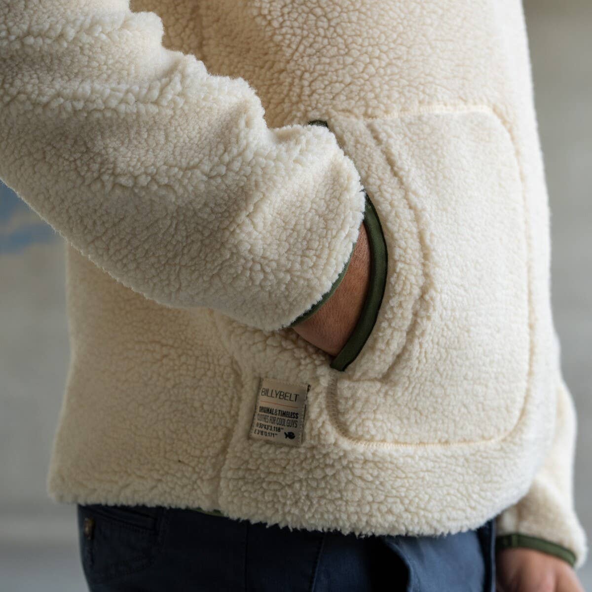 Felpa sherpa avorio con collo a zip