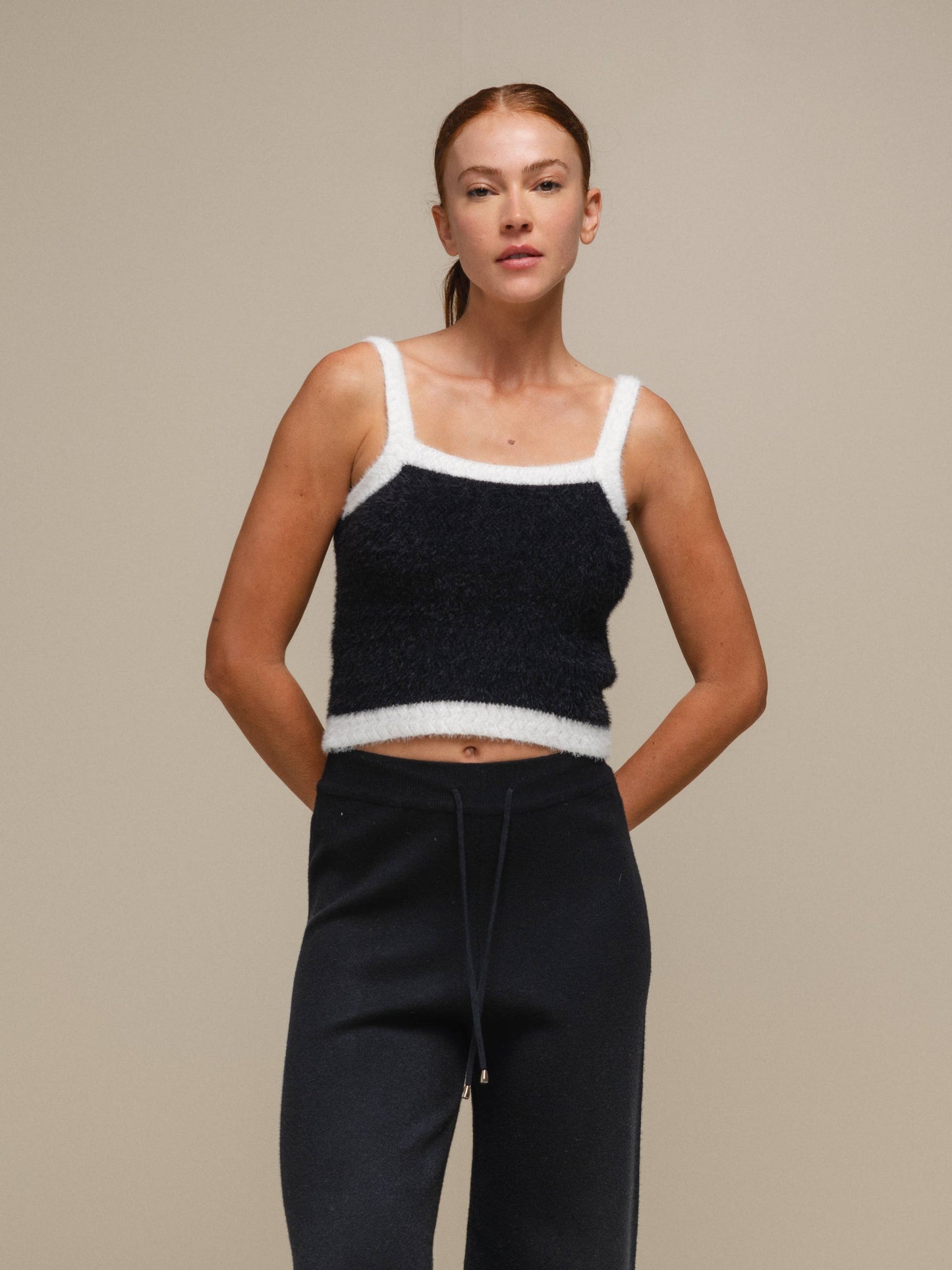 Top in maglia effetto fluffy bicolore