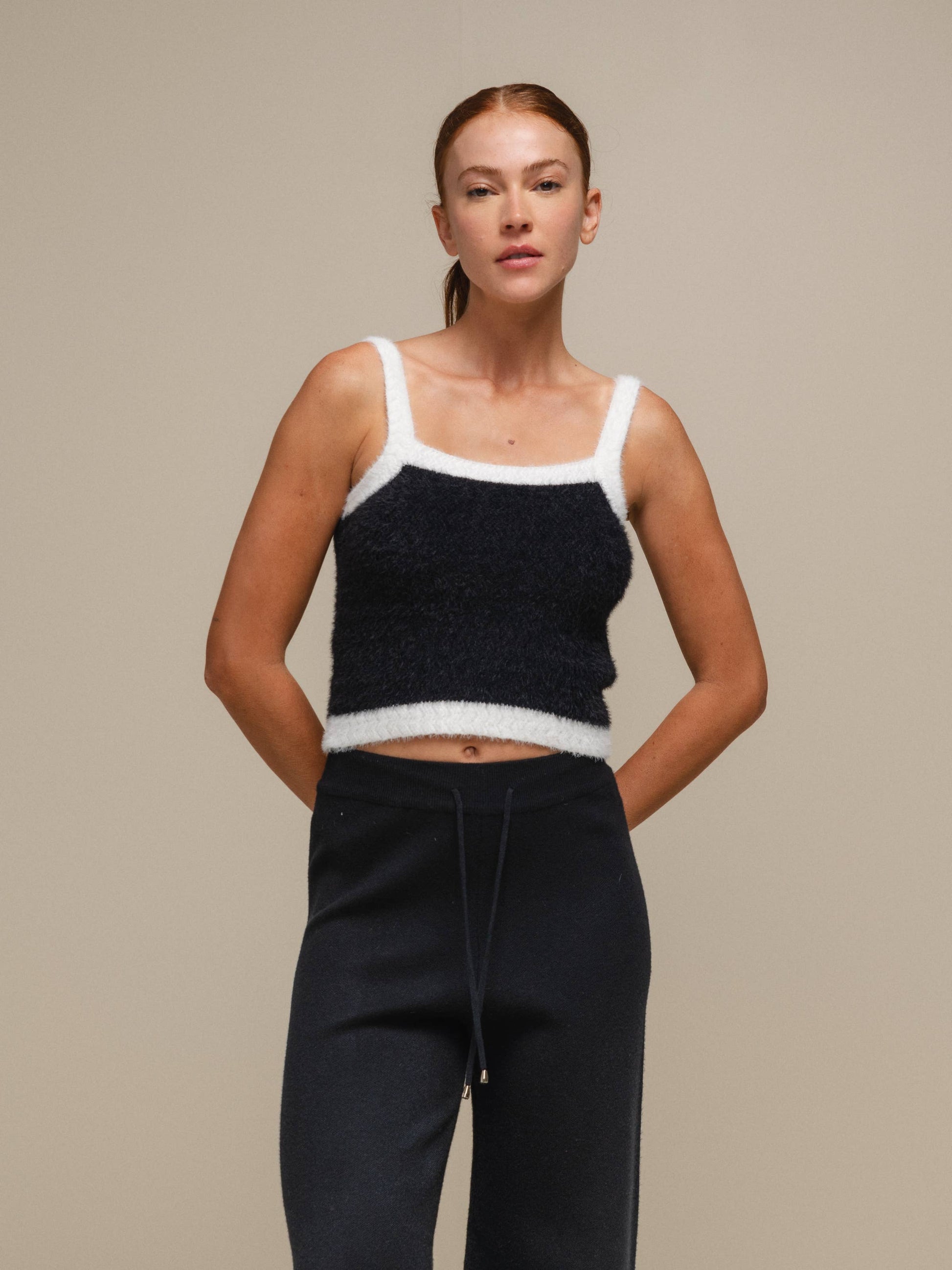 Top in maglia effetto fluffy bicolore