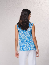 Blusa in raso stampato senza maniche con scollo a V