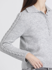 Polo in maglia con maniche a treccia