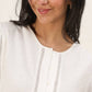 Blusa Tal con bottoni e maniche a sbuffo