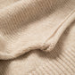 Maglione oversize in lana con collo alto e maniche a pipistrello