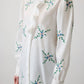 Camicia in popeline ricamata a fiori con volant