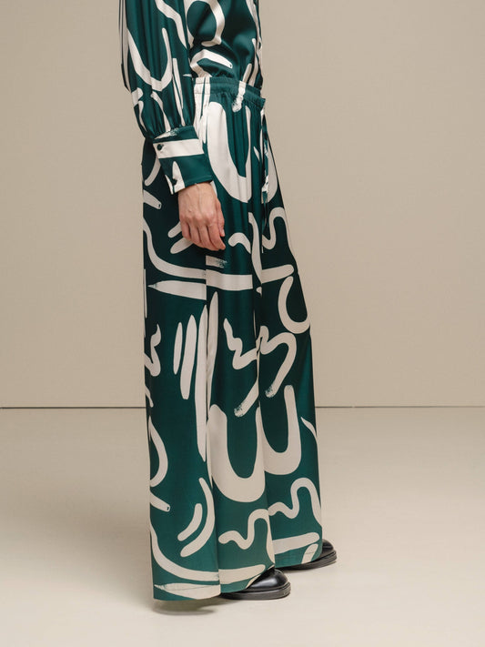 Pantaloni palazzo con stampa astratta e vita elasticizzata