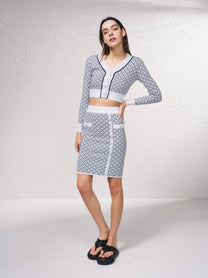 Gonna midi in maglia jacquard con bottoni decorativi
