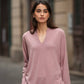 Maglia rosa con scollo a V