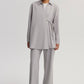 Completo pantaloni e camicia kimono con laccetti incrociati