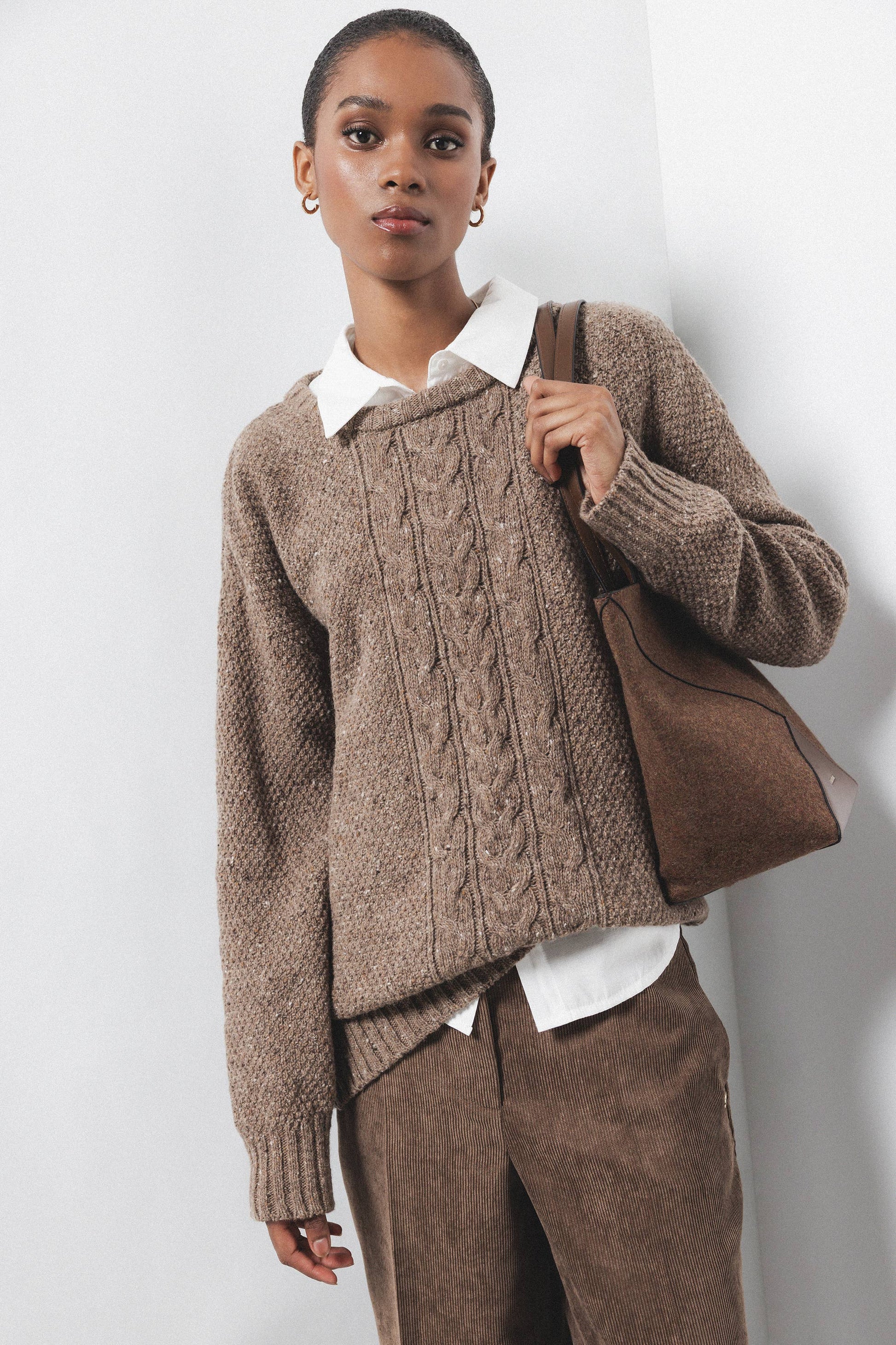 Maglione in lana a trecce