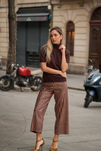 Pantaloni cropped a quadri con paillettes