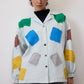 Giacca in gabardine con toppe colorate