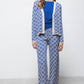 Pantaloni in maglia jacquard a motivo geometrico