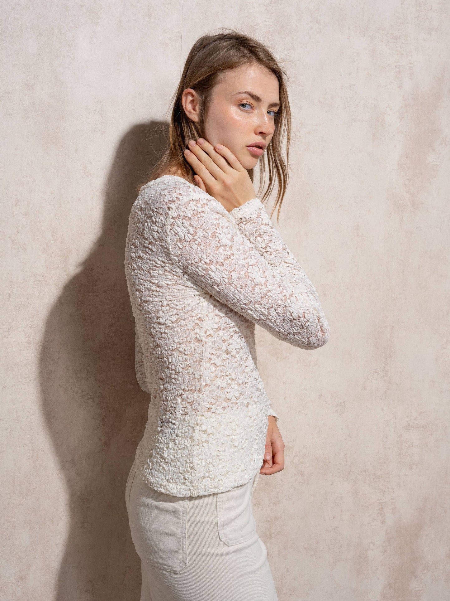 Blusa in pizzo elasticizzato
