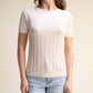 Top in maglia a trecce a maniche corte