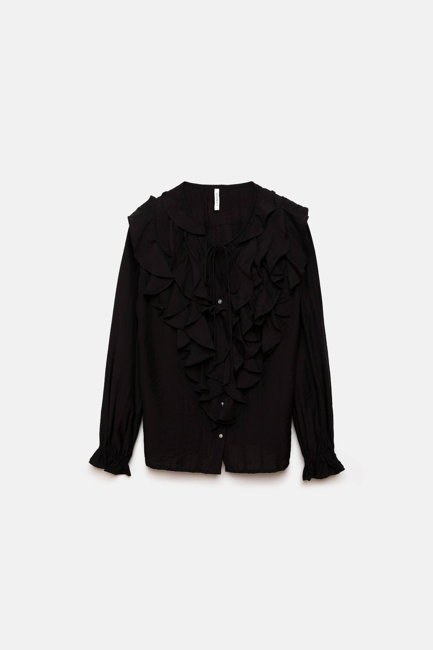 Blusa nera con volant e laccio al collo