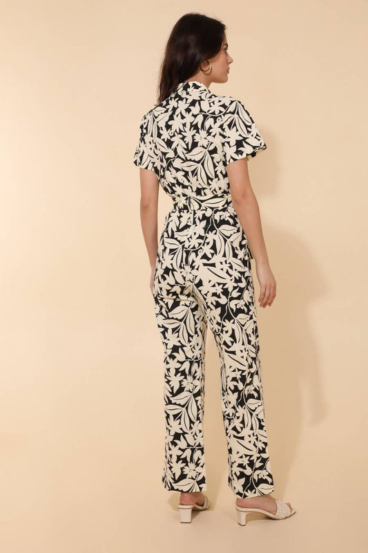 Tuta floreale con scollo a V e cintura