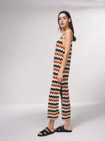 Vestito lungo in maglia traforata a righe con scollo profondo