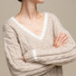 Maglione donna a trecce con scollo a V