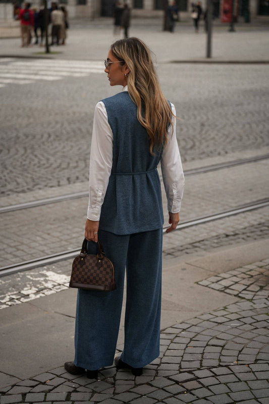Tunica in maglia con cintura e scollo a V