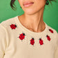 Maglia bianca con ricamo di coccinelle Gloria
