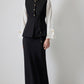 Gilet aderente con bottoni dorati