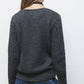 Maglione in maglia strutturata con scollo a V