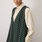 Abito lungo smanicato in tweed con scollo a V
