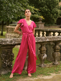 Tuta jumpsuit Pintas a pois fucsia