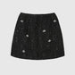 Gonna mini in tweed con strass e perle