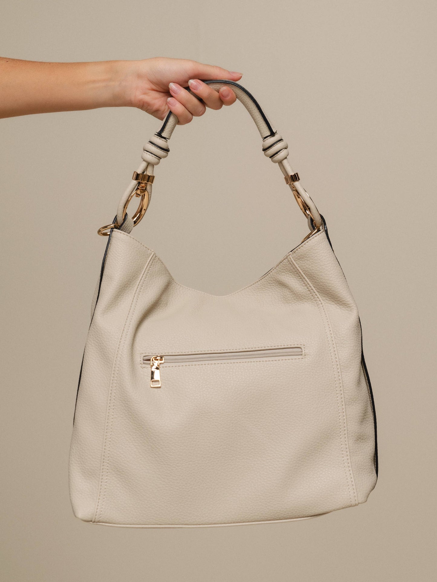 Borsa hobo in ecopelle con manico intrecciato