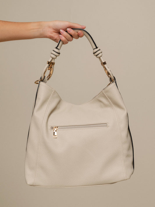 Borsa hobo in ecopelle con manico intrecciato