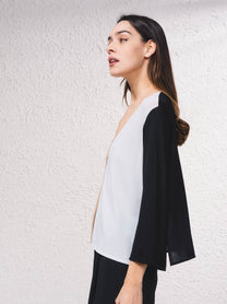 Giacca in maglia color block con scollo a V
