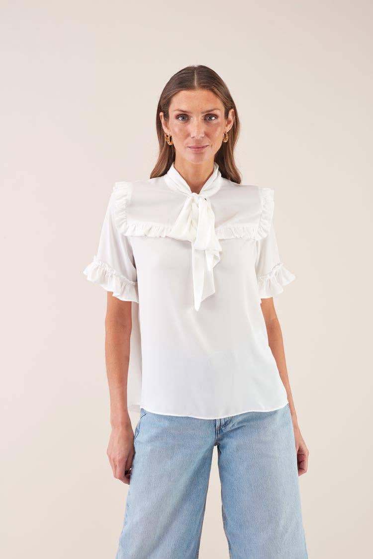 Blusa con fiocco e volant Lacada