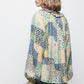 Blusa patchwork multicolor con scollo a V