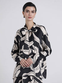 Blusa fluida con fiocco e stampa grafica