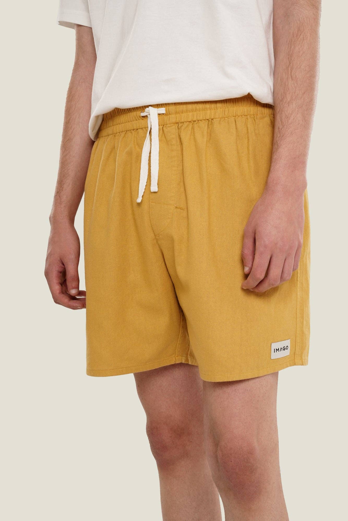 Short in lino oro unisex