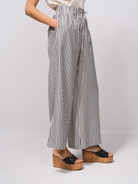 Pantaloni palazzo a righe con vita elasticizzata e laccio